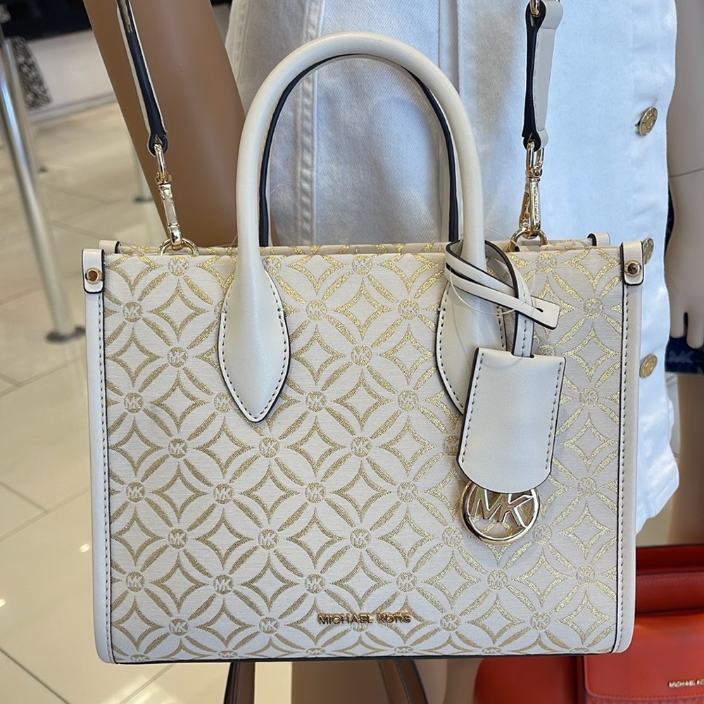 Michael Kors Mirella Small Metallic Logo Jacquard Crossbody Bag
Light Cream 
NWT - Picture 10 of 16